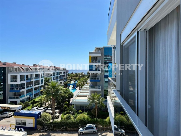 Квартира 1+1 с боковым видом на море в районе Кестель-id-8387-фото-11