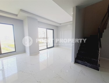 Современный дуплекс 100 м², с террасой в Махмутларе-id-8389-фото-3