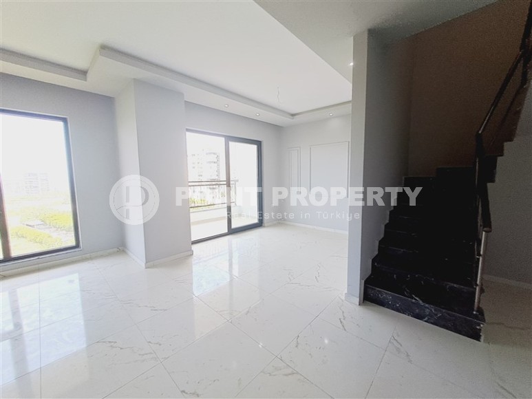 Современный дуплекс 100 м², с террасой в Махмутларе-id-8389-фото-3