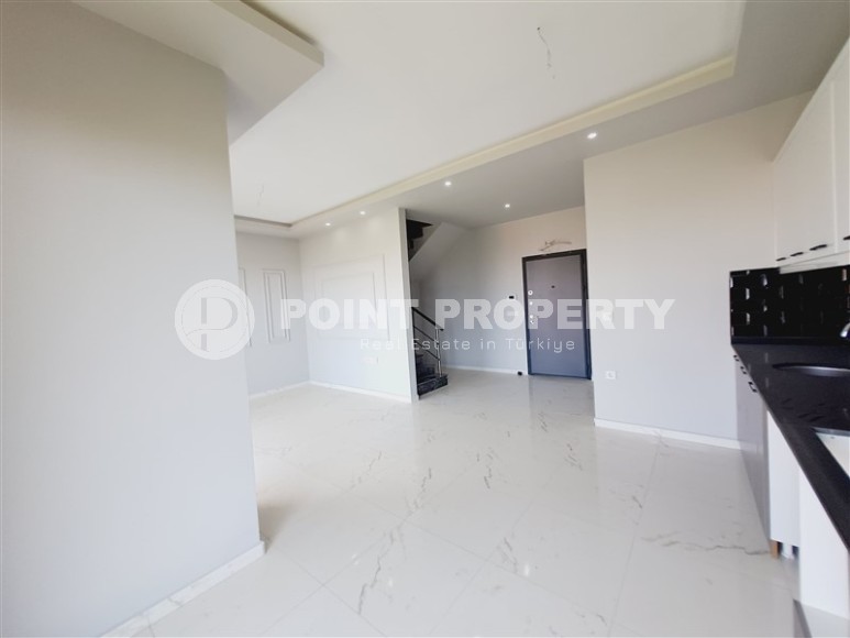 Современный дуплекс 100 м², с террасой в Махмутларе-id-8389-фото-4