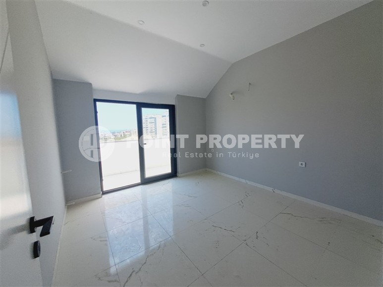 Современный дуплекс 100 м², с террасой в Махмутларе-id-8389-фото-7