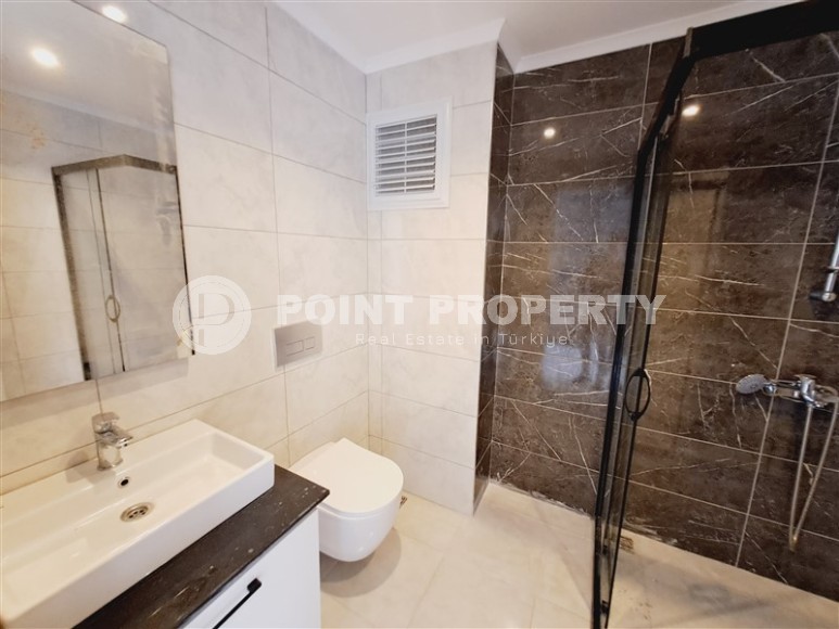 Современный дуплекс 100 м², с террасой в Махмутларе-id-8389-фото-9