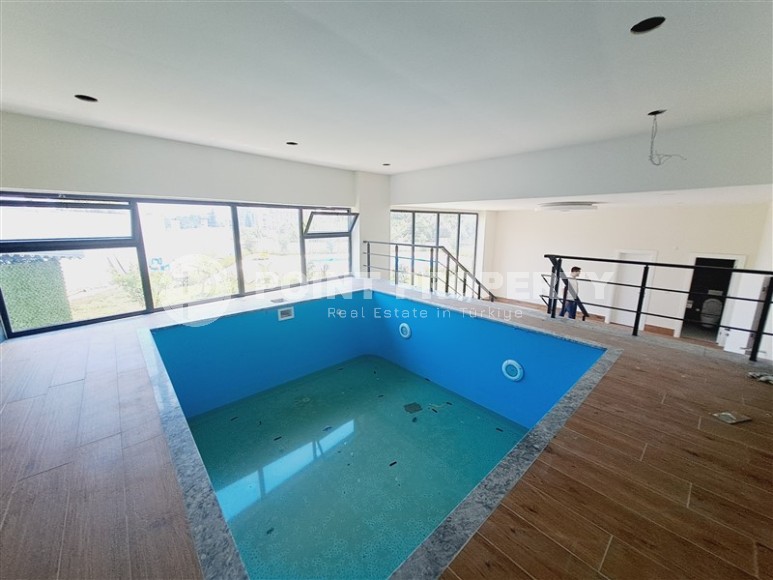 Современный дуплекс 100 м², с террасой в Махмутларе-id-8389-фото-13