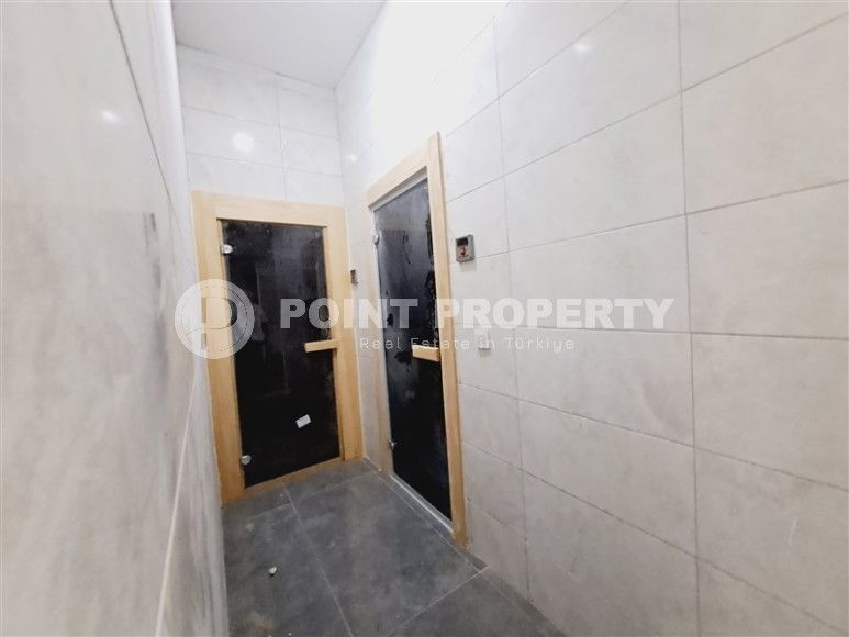 Современный дуплекс 100 м², с террасой в Махмутларе-id-8389-фото-16