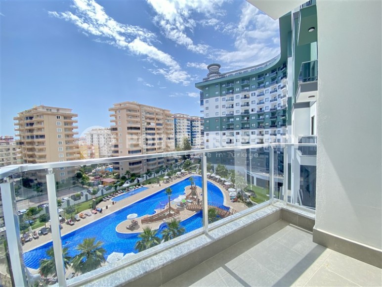 Квартира в элитном проекте Махмутлара всего в 550 метрах от моря-id-8394-фото-12