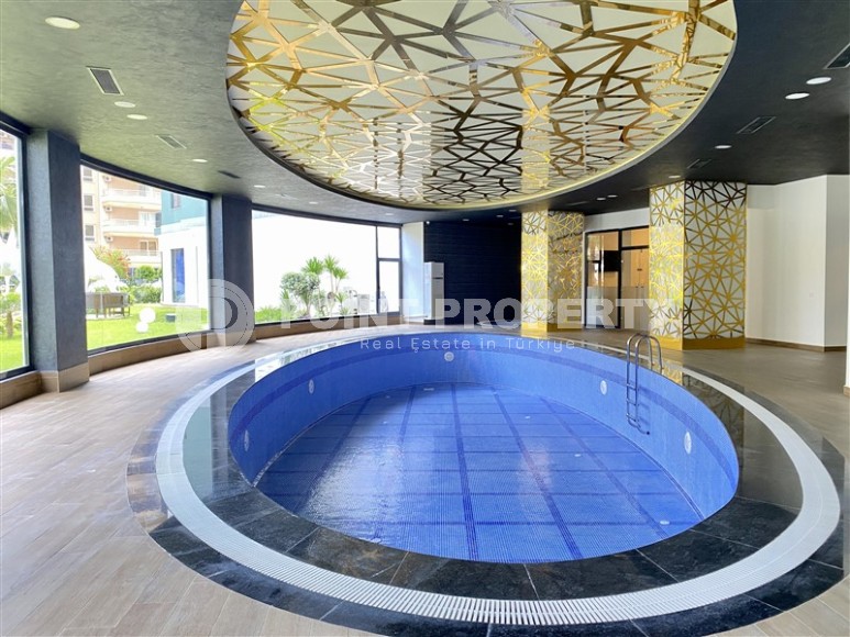 Квартира в элитном проекте Махмутлара всего в 550 метрах от моря-id-8394-фото-14