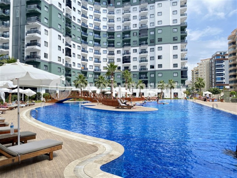 Квартира в элитном проекте Махмутлара всего в 550 метрах от моря-id-8394-фото-16