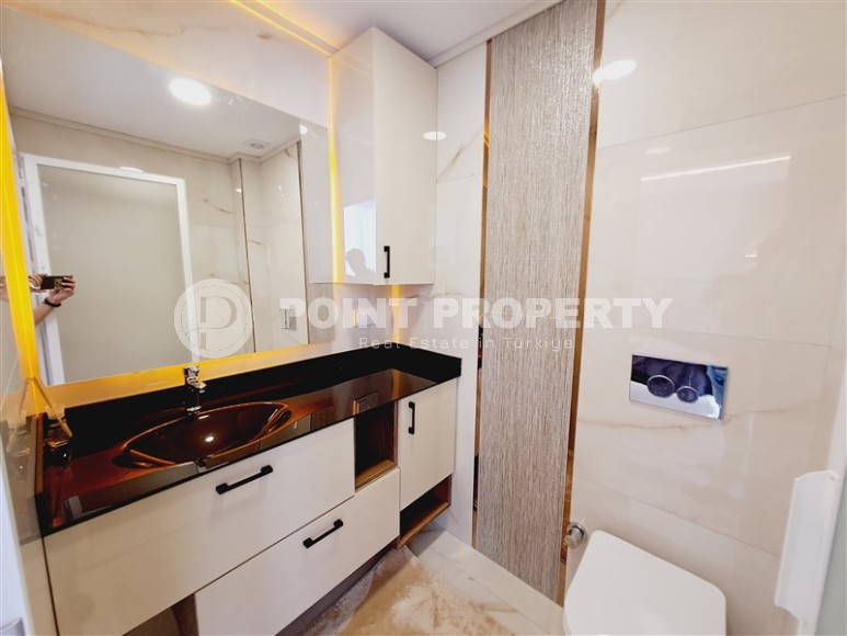 Новый проект в центре Аланьи: дуплексы и квартиры с садом в комплексе с роскошной инфраструктурой-id-8395-photo-2