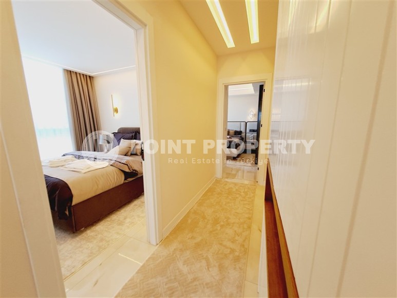 Новый проект в центре Аланьи: дуплексы и квартиры с садом в комплексе с роскошной инфраструктурой-id-8395-photo-4