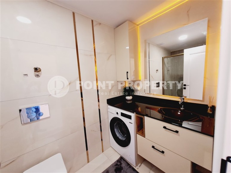 Новый проект в центре Аланьи: дуплексы и квартиры с садом в комплексе с роскошной инфраструктурой-id-8395-photo-12