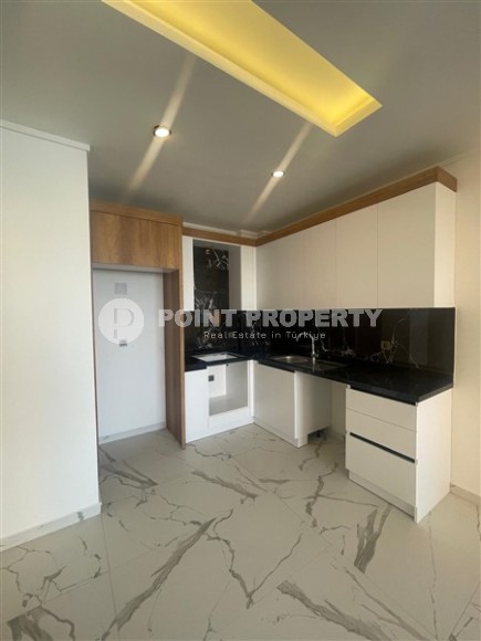 Современная квартира 58 м² в престижном комплексе в Авсалларе-id-8396-фото-3