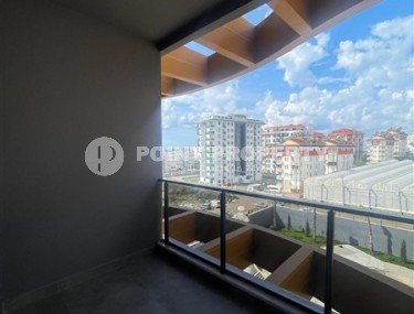 Современная квартира 58 м² в престижном комплексе в Авсалларе-id-8396-фото-5