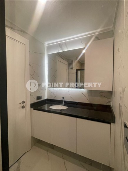 Современная квартира 58 м² в престижном комплексе в Авсалларе-id-8396-фото-9