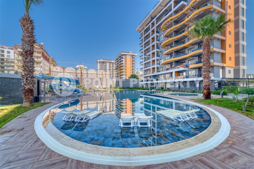 Современная квартира 58 м² в престижном комплексе в Авсалларе-id-8396-фото-22