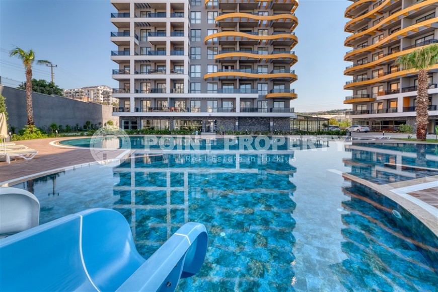 Современная квартира 58 м² в престижном комплексе в Авсалларе-id-8396-фото-23