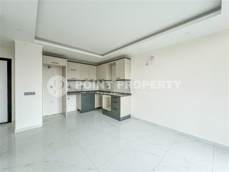 Современная квартира в живописном районе Алании Авсаллар-id-8407-фото-3