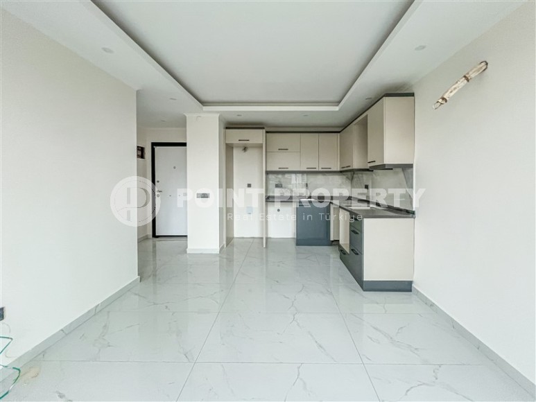 Современная квартира в живописном районе Алании Авсаллар-id-8407-фото-4