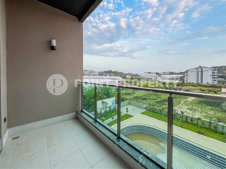 Современная квартира в живописном районе Алании Авсаллар-id-8407-фото-9