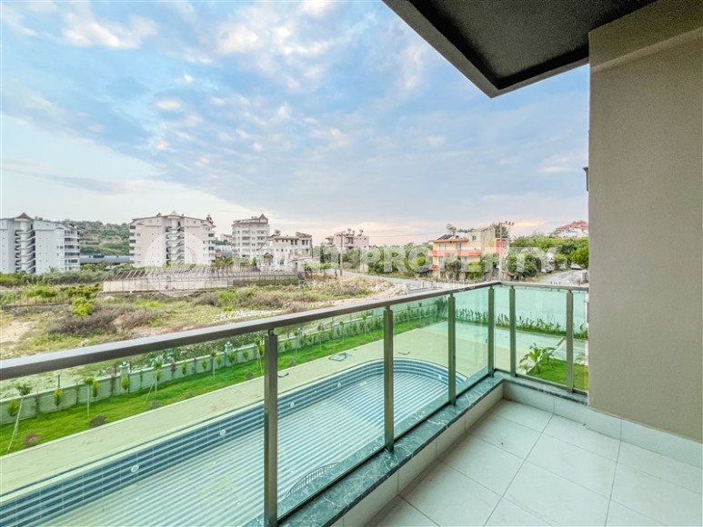 Современная квартира в живописном районе Алании Авсаллар-id-8407-фото-10