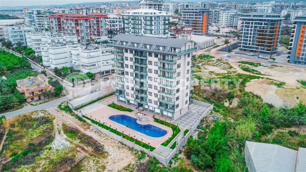 Современная квартира в живописном районе Алании Авсаллар-id-8407-фото-13