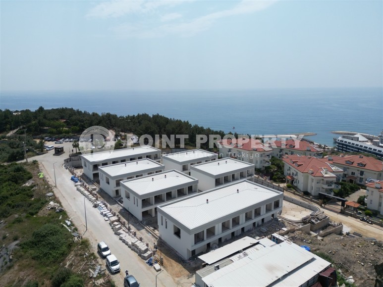 Эксклюзивный проект таунхаусов в 300 метрах от моря в районе Конаклы-id-8412-фото-18