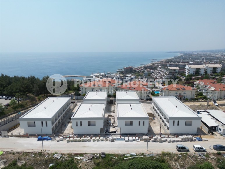 Эксклюзивный проект таунхаусов в 300 метрах от моря в районе Конаклы-id-8412-фото-19