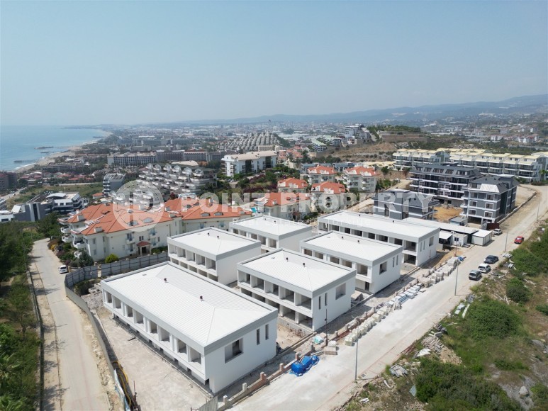 Эксклюзивный проект таунхаусов в 300 метрах от моря в районе Конаклы-id-8412-фото-20