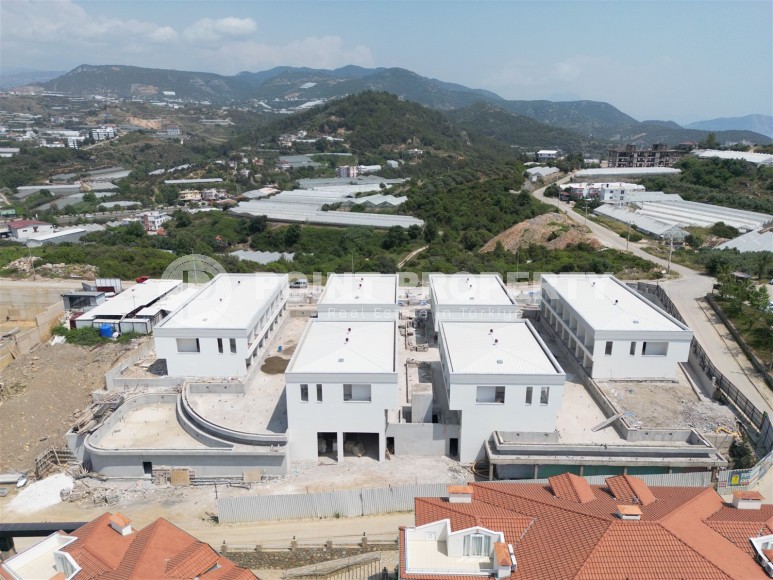 Эксклюзивный проект таунхаусов в 300 метрах от моря в районе Конаклы-id-8412-фото-22