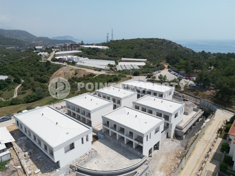 Эксклюзивный проект таунхаусов в 300 метрах от моря в районе Конаклы-id-8412-фото-23