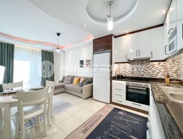 Просторная меблированная квартира вблизи от моря в популярном комплексе в Махмутларе-id-8416-фото-1