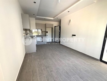 Просторная квартира 55 м² в новом комплексе в Махмутларе-id-8422-фото-2
