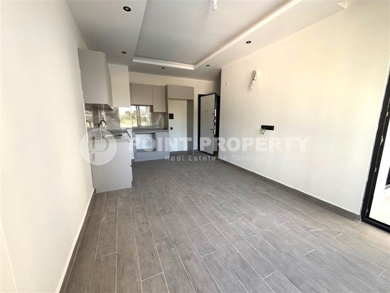 Просторная квартира 55 м² в новом комплексе в Махмутларе-id-8422-фото-2