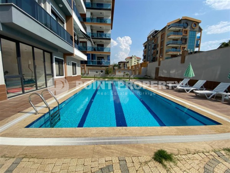 Меблированная двухкомнатная квартира 1+1, в новой резиденции в 250м от моря в районе Кестель, Алания-id-1662-фото-2