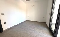 Просторная квартира 55 м² в новом комплексе в Махмутларе-id-8422-фото-4