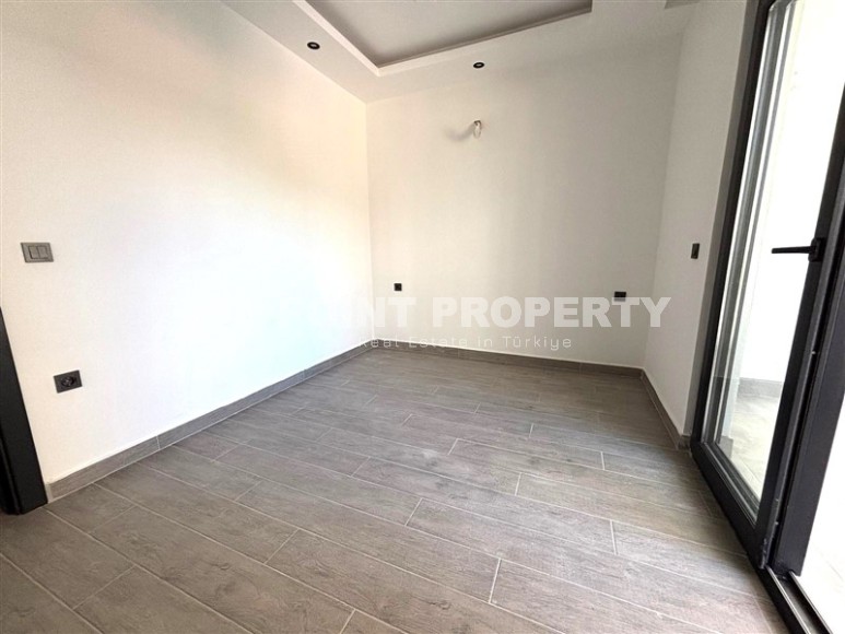 Просторная квартира 55 м² в новом комплексе в Махмутларе-id-8422-фото-4