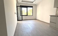 Просторная квартира 55 м² в новом комплексе в Махмутларе-id-8422-фото-7