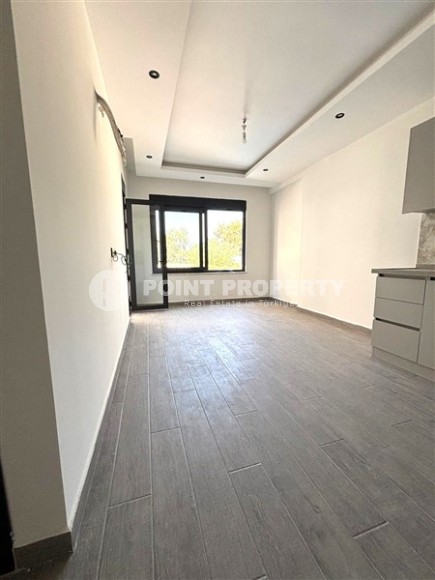 Просторная квартира 55 м² в новом комплексе в Махмутларе-id-8422-фото-7