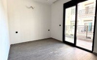 Просторная квартира 55 м² в новом комплексе в Махмутларе-id-8422-фото-8