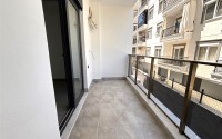 Просторная квартира 55 м² в новом комплексе в Махмутларе-id-8422-фото-10
