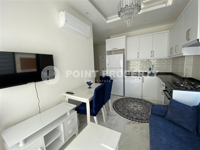 Меблированная двухкомнатная квартира 1+1, в новой резиденции в 250м от моря в районе Кестель, Алания-id-1662-фото-4