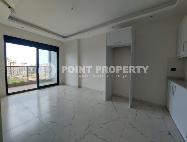 Новая квартира 56 м² в современном комплексе в Махмутларе-id-8428-фото-2