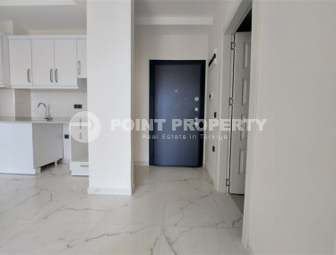 Новая квартира 56 м² в современном комплексе в Махмутларе-id-8428-фото-3