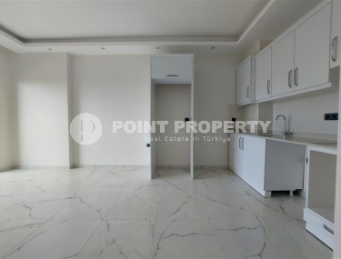 Новая квартира 56 м² в современном комплексе в Махмутларе-id-8428-фото-4