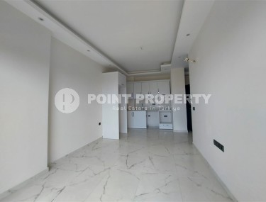 Новая квартира 56 м² в современном комплексе в Махмутларе-id-8428-фото-5