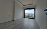 Новая квартира 56 м² в современном комплексе в Махмутларе-id-8428-фото-6