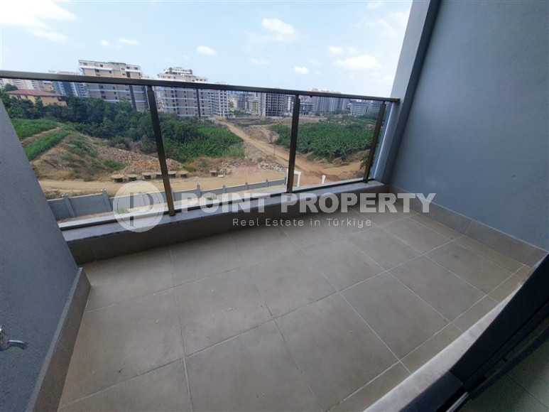 Новая квартира 56 м² в современном комплексе в Махмутларе-id-8428-фото-9