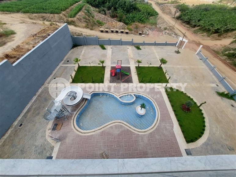 Новая квартира 56 м² в современном комплексе в Махмутларе-id-8428-фото-10