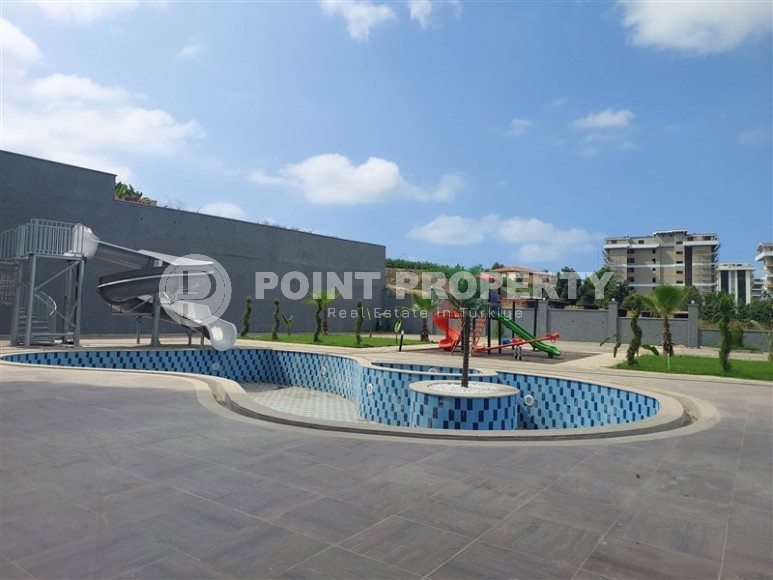 Новая квартира 56 м² в современном комплексе в Махмутларе-id-8428-фото-11