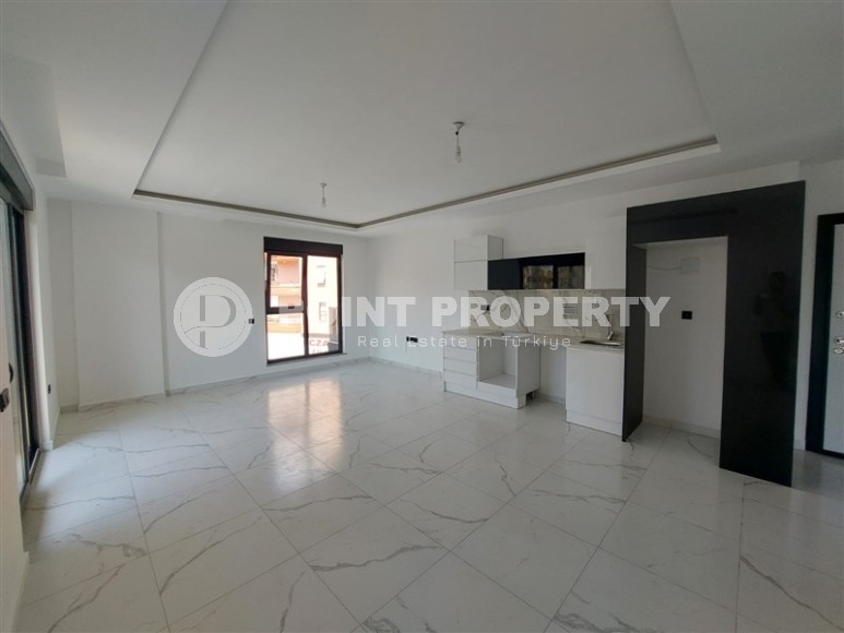 Квартира 1+1 в новом доме в центре Алании-id-8432-фото-3