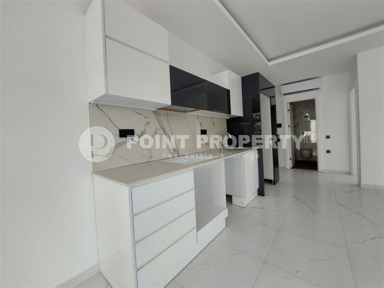 Квартира 1+1 в новом доме в центре Алании-id-8432-фото-6